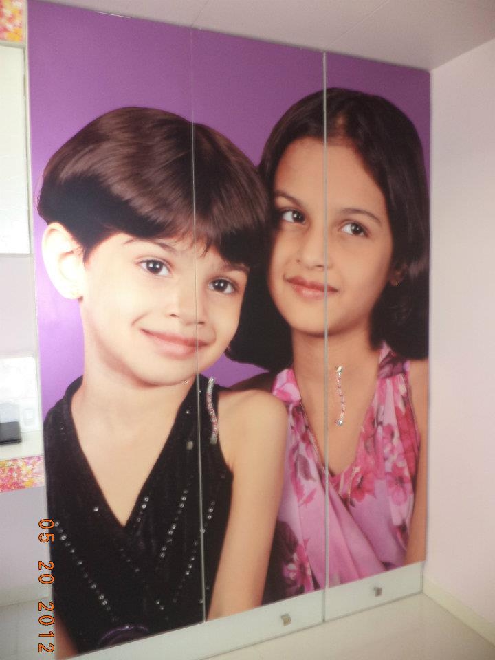 Personalized furniture printing of children’s photo on a cupboard as a great interior design idea for kids room